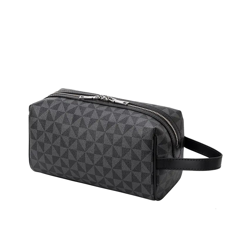 Black geometric patterned toiletry bag with a handle on a white background